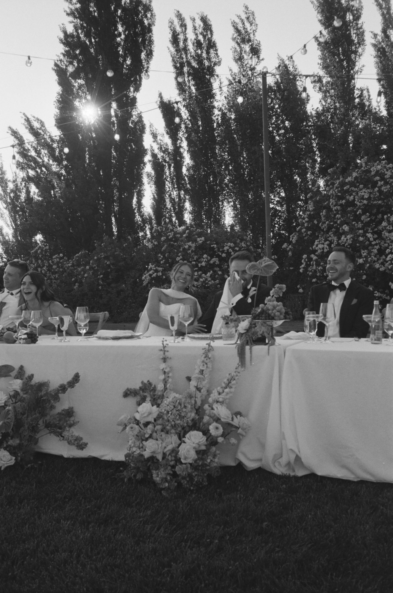 Shot of bride and groom during toasts